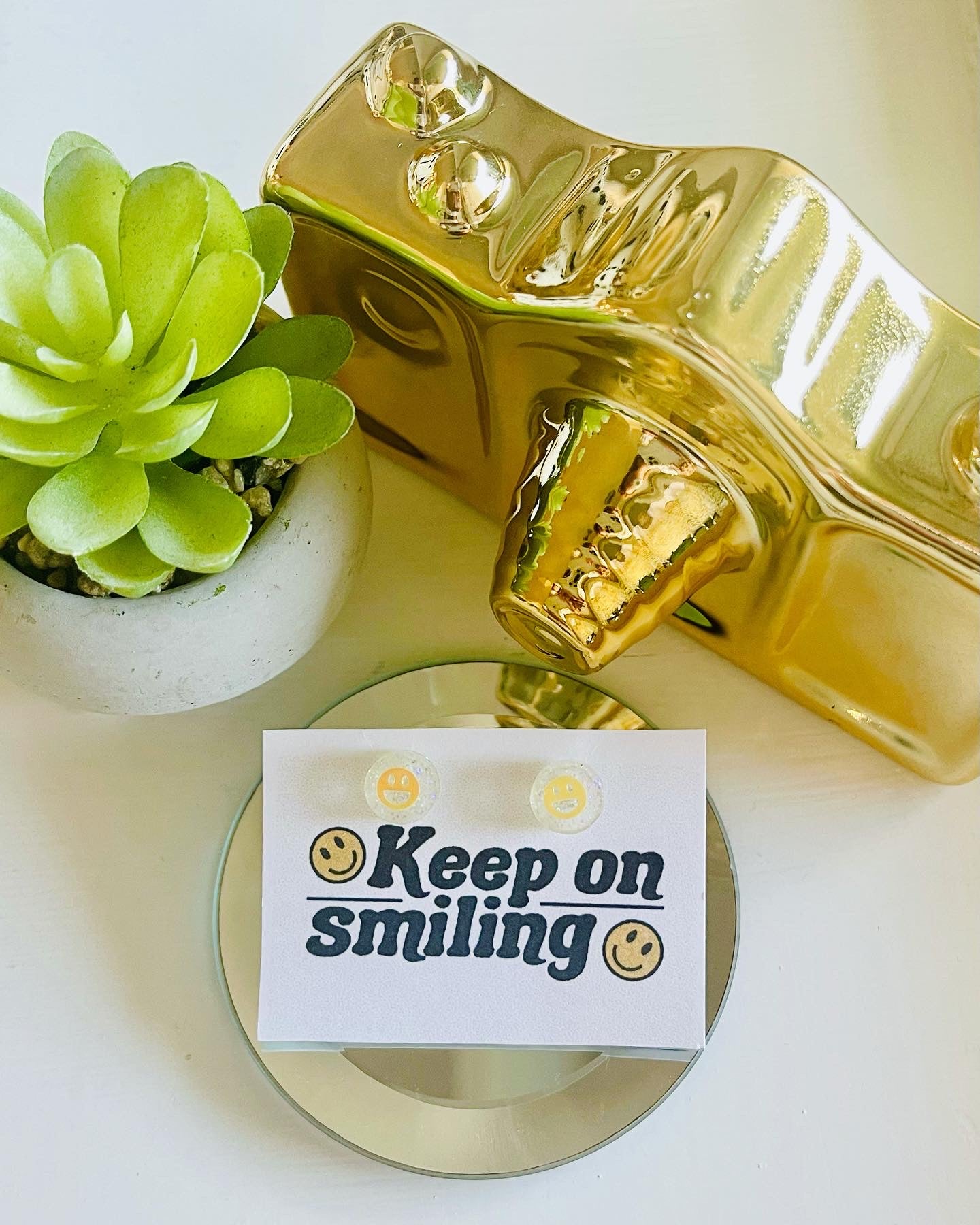 Keep up smiling studs